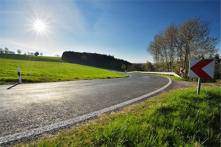 scenic view point sign - Winding Country Road with Sun in Spring, Neudorf, Amorbach, Odenwald, Bavaria, Germany Stock Photo - Premium Royalty-Free, Code: 600-08232265