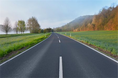 simsearch:600-08232277,k - Country Road in Morning, Himmelstadt, Main-Spessart District, Franconia, Bavaria, Germany Stock Photo - Premium Royalty-Free, Code: 600-08232273