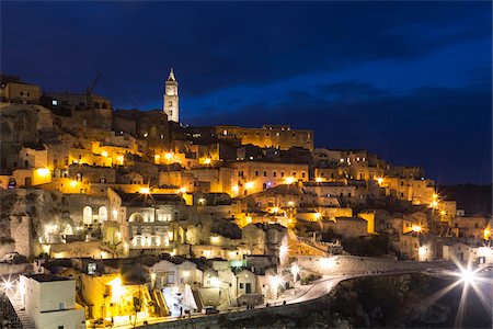 simsearch:700-08212979,k - Overview of Sassi di Matera at night with the cathedral bell tower, one of the three oldest cities in the world, Basilicata, Italy Stock Photo - Premium Royalty-Free, Code: 600-08386026