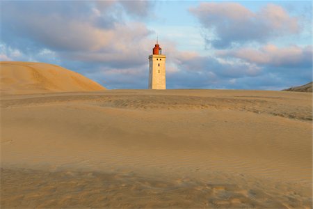 foreground - Sand Dune with Rubjerg Knude Lighthouse, Lokken, North Jutland, Denmark Stock Photo - Premium Royalty-Free, Code: 600-08519492