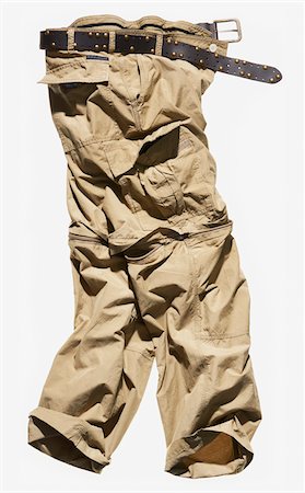 simsearch:700-02756413,k - Beige cargo pants with belt on white background Stock Photo - Premium Royalty-Free, Code: 600-08542900