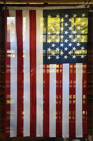 foreground (something in the foreground) - View of translucent American flag on back porch Stock Photo - Premium Royalty-Free, Code: 600-08765235