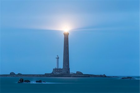 simsearch:700-05803759,k - L'Ile Vierge Lighthouse on L'Ile Vierge illuminated at night in the Lilia Archipelago in Lilia Archipelago, Brittany France Stock Photo - Premium Royalty-Free, Code: 600-08765578