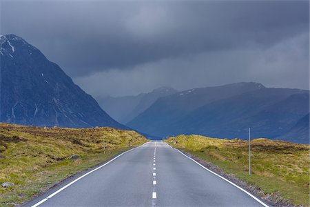 simsearch:600-06847380,k - Country road with dark cloudy sky in the highlands on A82 road in Glen Coe, Scotland, United Kingdom Stock Photo - Premium Royalty-Free, Code: 600-08973443