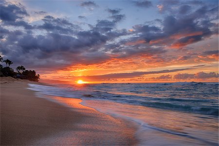 simsearch:633-06322603,k - Sunset and surf on the Pacific Ocean at Sunset Beach on Oahu, Hawaii, USA Stock Photo - Premium Royalty-Free, Code: 600-08986239