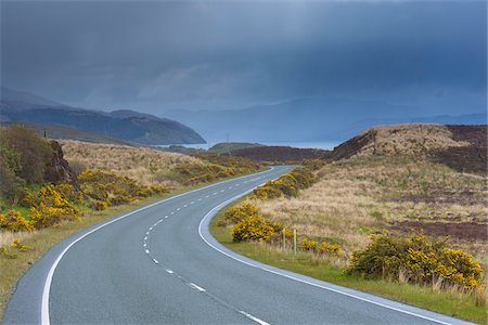 simsearch:6118-08399701,k - Winding country road with an overcast sky in springtime on the Isle of Skye in Scotland, United Kingdom Stock Photo - Premium Royalty-Free, Code: 600-08986290