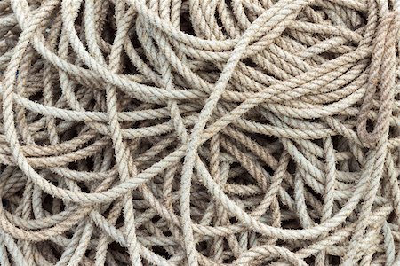 simsearch:6118-08910527,k - Close-up of a pile of rope in the harbor at Seahouses in Northumberland, England, United Kingdom Photographie de stock - Premium Libres de Droits, Code: 600-09013890