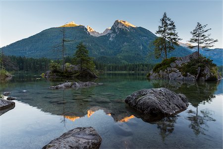 simsearch:600-07844441,k - Lake Hintersee with mountains at sunset at Ramsau in the Berchtesgaden National Park in Upper Bavaria, Bavaria, Germany Stock Photo - Premium Royalty-Free, Code: 600-09022460