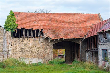 simsearch:700-05947713,k - Old stone barn with broken corrugated roof in Hesse, Germany Stock Photo - Premium Royalty-Free, Code: 600-09035332