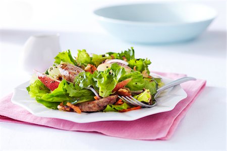 simsearch:700-03053816,k - Romaine and apple salad with turkey sausage Stock Photo - Premium Royalty-Free, Code: 600-09119484