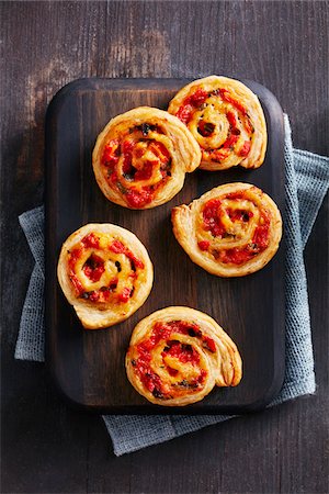 simsearch:600-07311268,k - Cheese and red pepper spiral appetizers Stock Photo - Premium Royalty-Free, Code: 600-09159782
