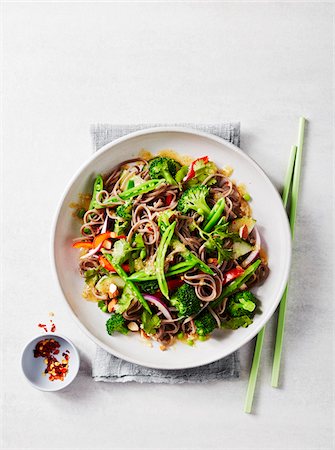 simsearch:6118-07808971,k - Soba noodle salad with chopsticks and chili flakes Stock Photo - Premium Royalty-Free, Code: 600-09159809