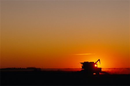 Silhouette of Combine at Sunset Alberta, Canada Stock Photo - Premium Royalty-Free, Code: 600-00013556