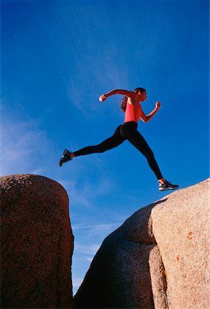 simsearch:400-04535435,k - Woman Jumping Gap Joshua Tree, California, USA Stock Photo - Premium Royalty-Free, Code: 600-00024494