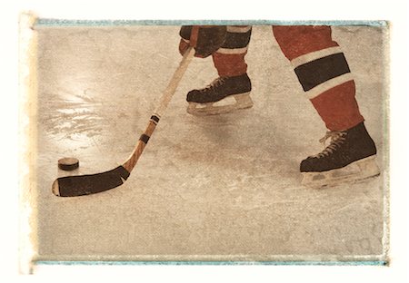 simsearch:700-00035072,k - Close-Up of Hockey Player Skating With Puck Stock Photo - Premium Royalty-Free, Code: 600-00035557