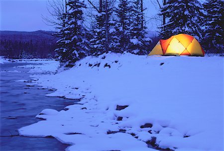 Glowing Tent near River in Winter Kananaskis Country, Alberta Canada Stock Photo - Premium Royalty-Free, Code: 600-00046068