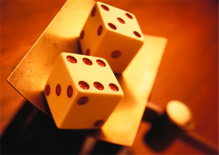 Close-Up of Dice on Scale Stock Photo - Premium Royalty-Free, Code: 600-00049106