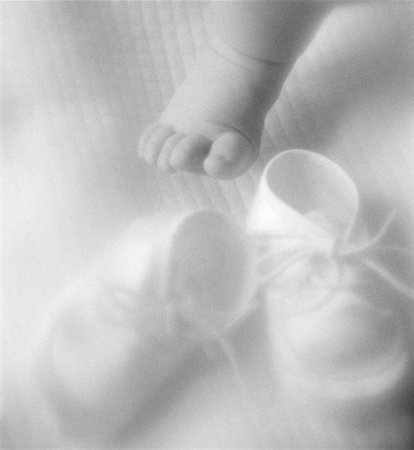 Close-Up of Baby's Foot and Shoes Stock Photo - Premium Royalty-Free, Code: 600-00042834