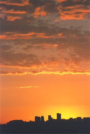 phoenix skyline sunrise - Silhouette of City Skyline at Sunset Phoenix, Arizona, USA Stock Photo - Premium Royalty-Free, Code: 600-00051715