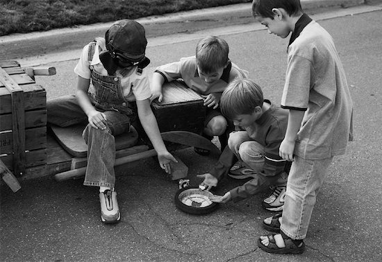 old black and white photos of children. lack and white children play