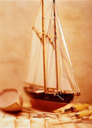 Model Ship and Carving Tools Stock Photo - Premium Royalty-Free, Code: 600-00060721