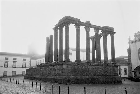 simsearch:600-00177062,k - Column Ruins near Buildings, Evora, Portugal Stock Photo - Premium Royalty-Free, Code: 600-00062778