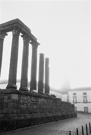 simsearch:600-00177062,k - Column Ruins near Buildings, Evora, Portugal Stock Photo - Premium Royalty-Free, Code: 600-00062779