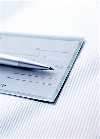 pen (writing instrument) - Pen and Cheque Stock Photo - Premium Royalty-Free, Code: 600-00270112