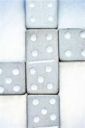 set (pair or group of things) - Close-Up of Dominos Stock Photo - Premium Royalty-Free, Code: 600-00551117