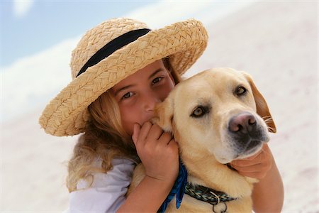 pictures of a little girl whispering - Portriat of Girl with Dog Stock Photo - Premium Royalty-Free, Code: 600-00795579