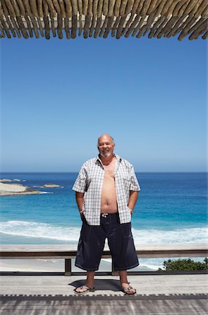 simsearch:700-01163568,k - Man Standing by the Beach Stock Photo - Premium Royalty-Free, Code: 600-00796361