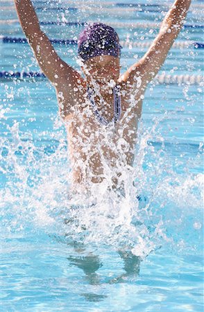 simsearch:600-00814698,k - Boy Cheering in Swimming Pool Stock Photo - Premium Royalty-Free, Code: 600-00814604