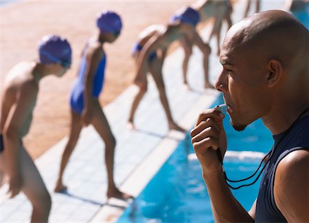 Coach Blowing Whistle Stock Photo - Premium Royalty-Free, Code: 600-00814626