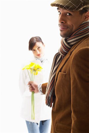 simsearch:600-00910373,k - Man Giving Woman Flowers Stock Photo - Premium Royalty-Free, Code: 600-00823185