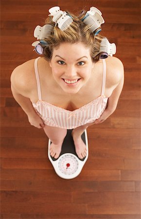 simsearch:600-03018098,k - Woman Weighing Self Stock Photo - Premium Royalty-Free, Code: 600-00846011