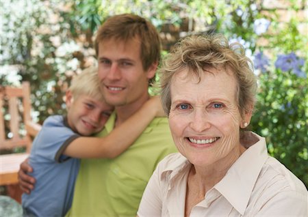 simsearch:700-00069467,k - Grandmother and Family Outdoors Stock Photo - Premium Royalty-Free, Code: 600-00847719