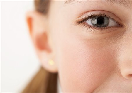 simsearch:600-00847925,k - Close-Up of Girl's Face Stock Photo - Premium Royalty-Free, Code: 600-00847927