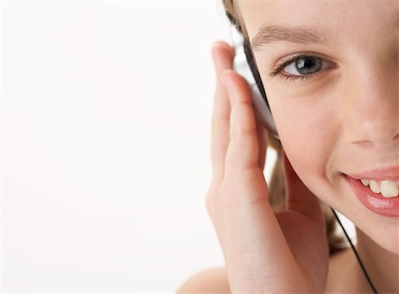 simsearch:600-00847925,k - Girl Listening to Headphones Stock Photo - Premium Royalty-Free, Code: 600-00847939