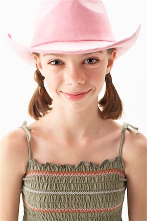 simsearch:600-00847925,k - Girl in Pink Cowboy Hat Stock Photo - Premium Royalty-Free, Code: 600-00847947
