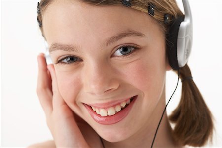 simsearch:600-00847925,k - Girl Listening to Headphones Stock Photo - Premium Royalty-Free, Code: 600-00847940