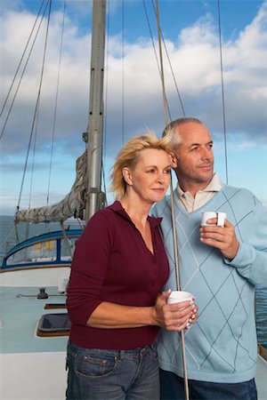 sports and sailing - Couple on Boat Stock Photo - Premium Royalty-Free, Code: 600-00848552