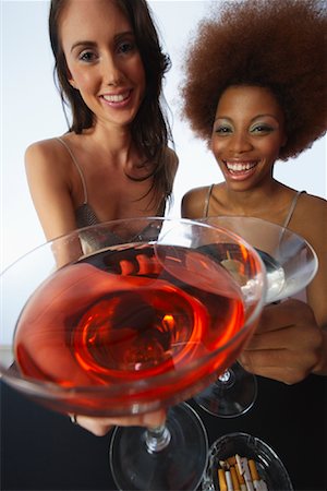 simsearch:600-00983852,k - Woman Drinking Martinis Foto de stock - Sin royalties Premium, Código: 600-00848739