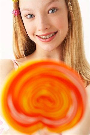 Girl with Lollipop Stock Photo - Premium Royalty-Free, Code: 600-00866097