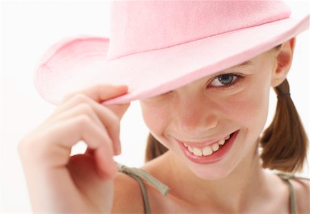 simsearch:600-00847925,k - Girl Tipping Hat Stock Photo - Premium Royalty-Free, Code: 600-00866130