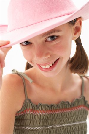 simsearch:600-00847925,k - Girl Tipping Hat Stock Photo - Premium Royalty-Free, Code: 600-00866131