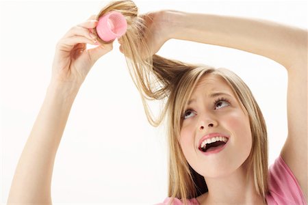 simsearch:600-00866185,k - Girl with Curler in Hair Stock Photo - Premium Royalty-Free, Code: 600-00866218