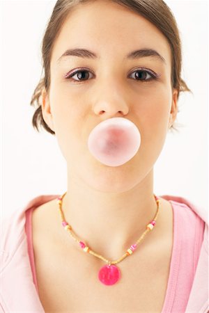 preteen girls stretching - Girl Blowing Bubble Stock Photo - Premium Royalty-Free, Code: 600-00866258