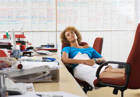 Woman Asleep On The Job Stock Photo - Premium Royalty-Free, Code: 600-00897387