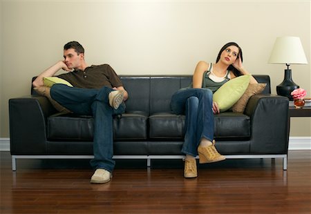 simsearch:700-00683334,k - Couple Sitting on Couch Stock Photo - Premium Royalty-Free, Code: 600-00909631