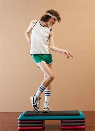 Man Doing Step Aerobics Stock Photo - Premium Royalty-Free, Code: 600-00917041